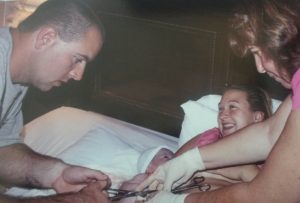 a father cutting his baby's umbilical cord as mother watches with joy, birth timelines